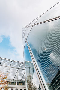 Low angle view of modern building against sky