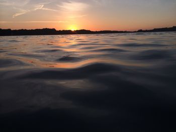 Scenic view of sunset over river