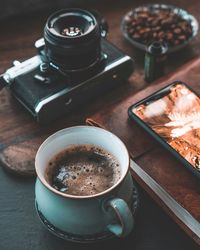 High angle view of coffee cup on table