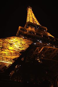 Low angle view of illuminated city at night