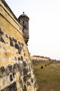 Low angle view of historical building against clear sky