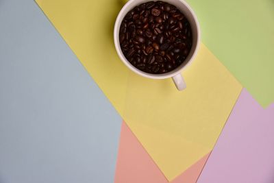 High angle view of coffee cup on table