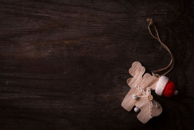 Close-up of christmas decorations on wood