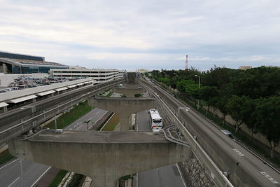 High angle view of highway in city against sky