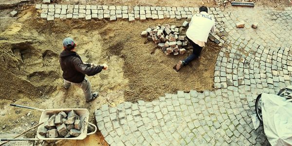 High angle view of man working on street