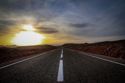 Road against sky during sunset