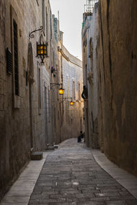 Narrow alley along buildings