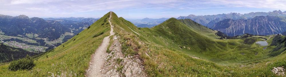 Panoramic view of mountain range against sky