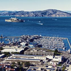 High angle view of city by sea