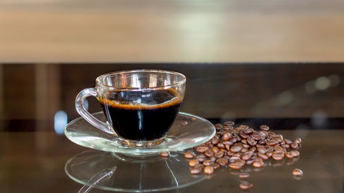 Close-up of coffee cup on table