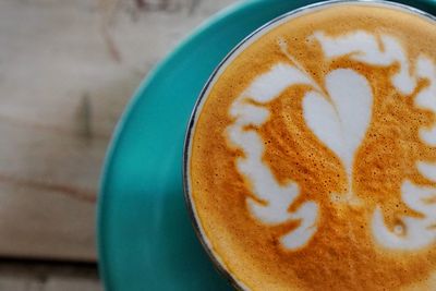 Close-up of cappuccino on table