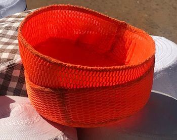 Close up of red wicker basket