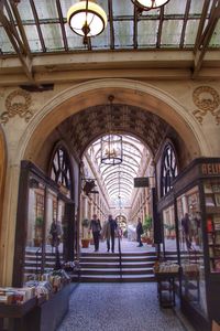 View of people walking on tiled floor