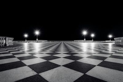 Illuminated street lights at night