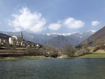 Scenic view of mountains against cloudy sky