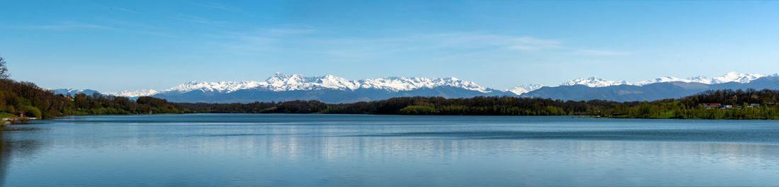 Scenic view of lake against blue sky