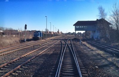 Railroad tracks on railroad station platform