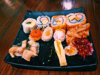 High angle view of sushi served on table