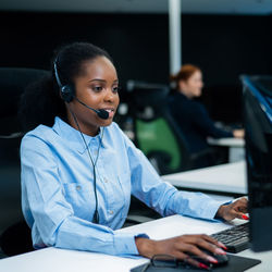 Businesswoman working at table