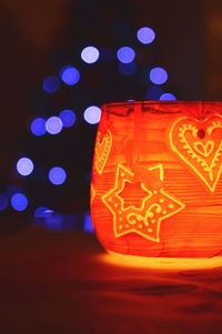 Close-up of illuminated lighting equipment