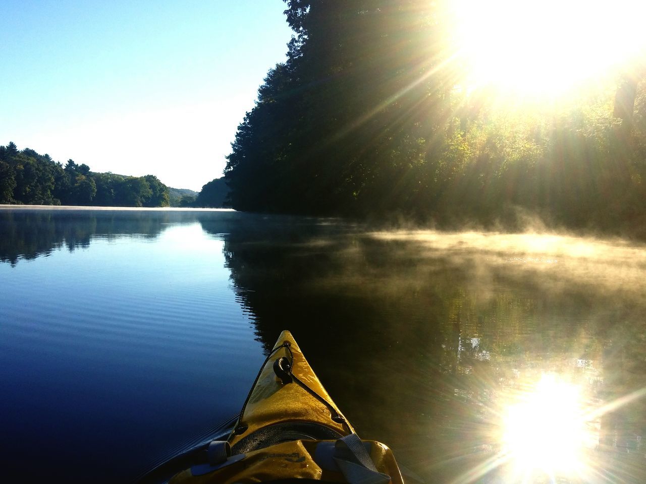 SUN SHINING OVER RIVER