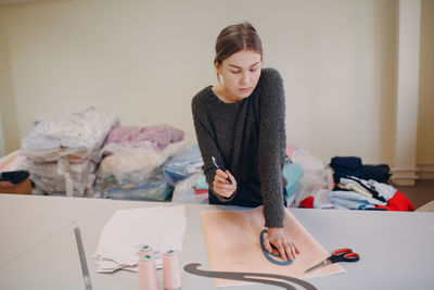 Woman working at textile factory