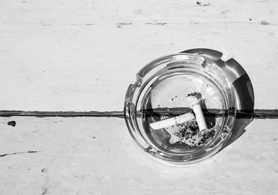 High angle view of cigarette on table