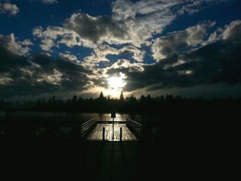 Scenic view of landscape against cloudy sky