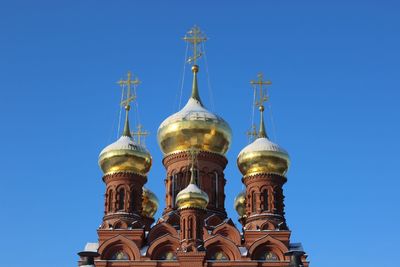 Low angle view of cathedral against clear blue sky