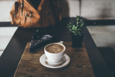 Close-up of coffee cup on table