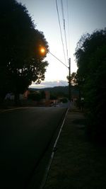 Street light against sky at night