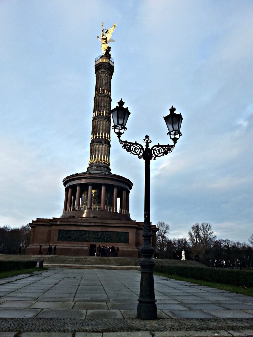 statue, sculpture, human representation, art and craft, art, architecture, built structure, sky, creativity, monument, famous place, low angle view, travel destinations, travel, building exterior, animal representation, capital cities, history