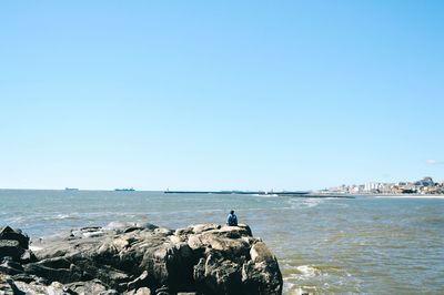 Scenic view of sea against clear sky