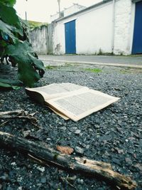 Open book on old building