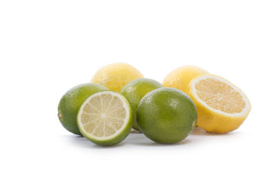 Close-up of fruits against white background