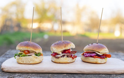 Close-up of burger on cutting board