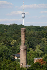 View of tower against cloudy sky