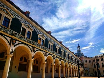 Low angle view of statue against sky in city