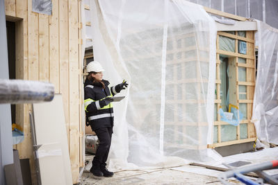 Female engineer at building site