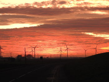 Scenic view of silhouette landscape against sky during sunset