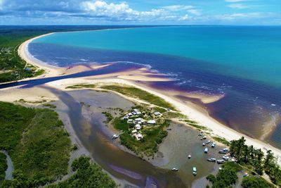 High angle view of sea shore against sky