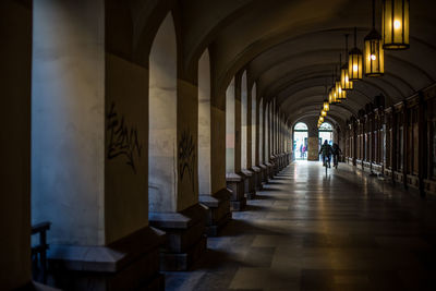 Man walking in corridor