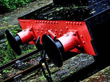 High angle view of fire hydrant by railroad tracks