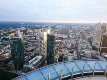 Aerial view of cityscape against sky