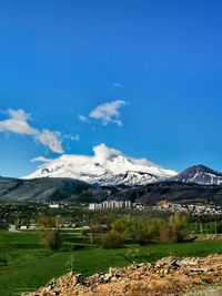 Scenic view of snowcapped mountains against sky