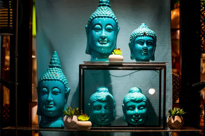 Buddha statue in temple outside building