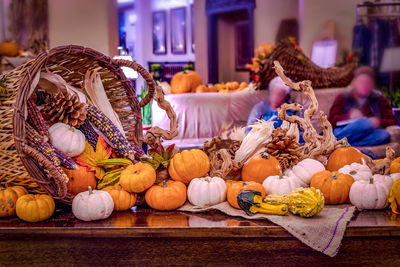 Pumpkins on wooden table during autumn