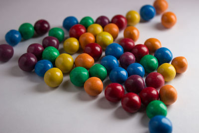 High angle view of multi colored balls on table