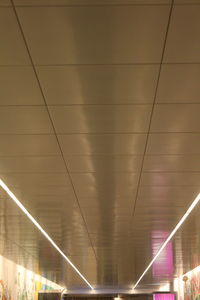 Low angle view of illuminated tunnel