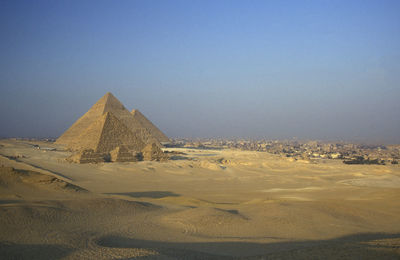 Scenic view of desert against clear sky